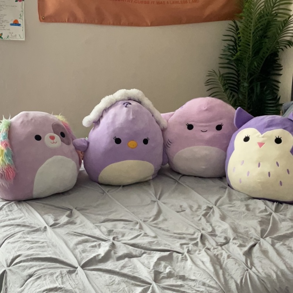4 large purple squishmallows